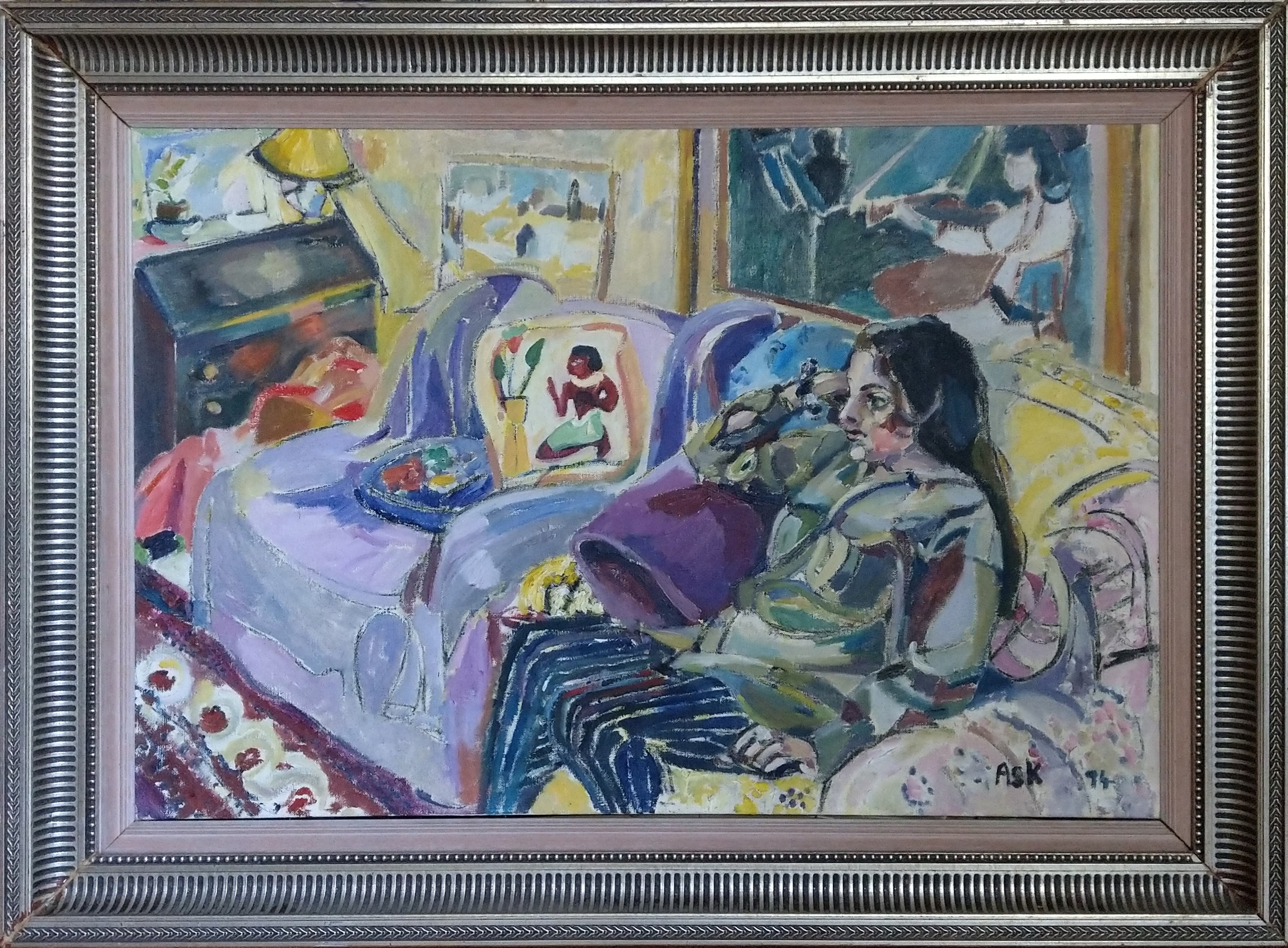 In this oil painting by Elaine Ask, Saskia sits in an armchair, staring at the TV, though you don't see the TV. 